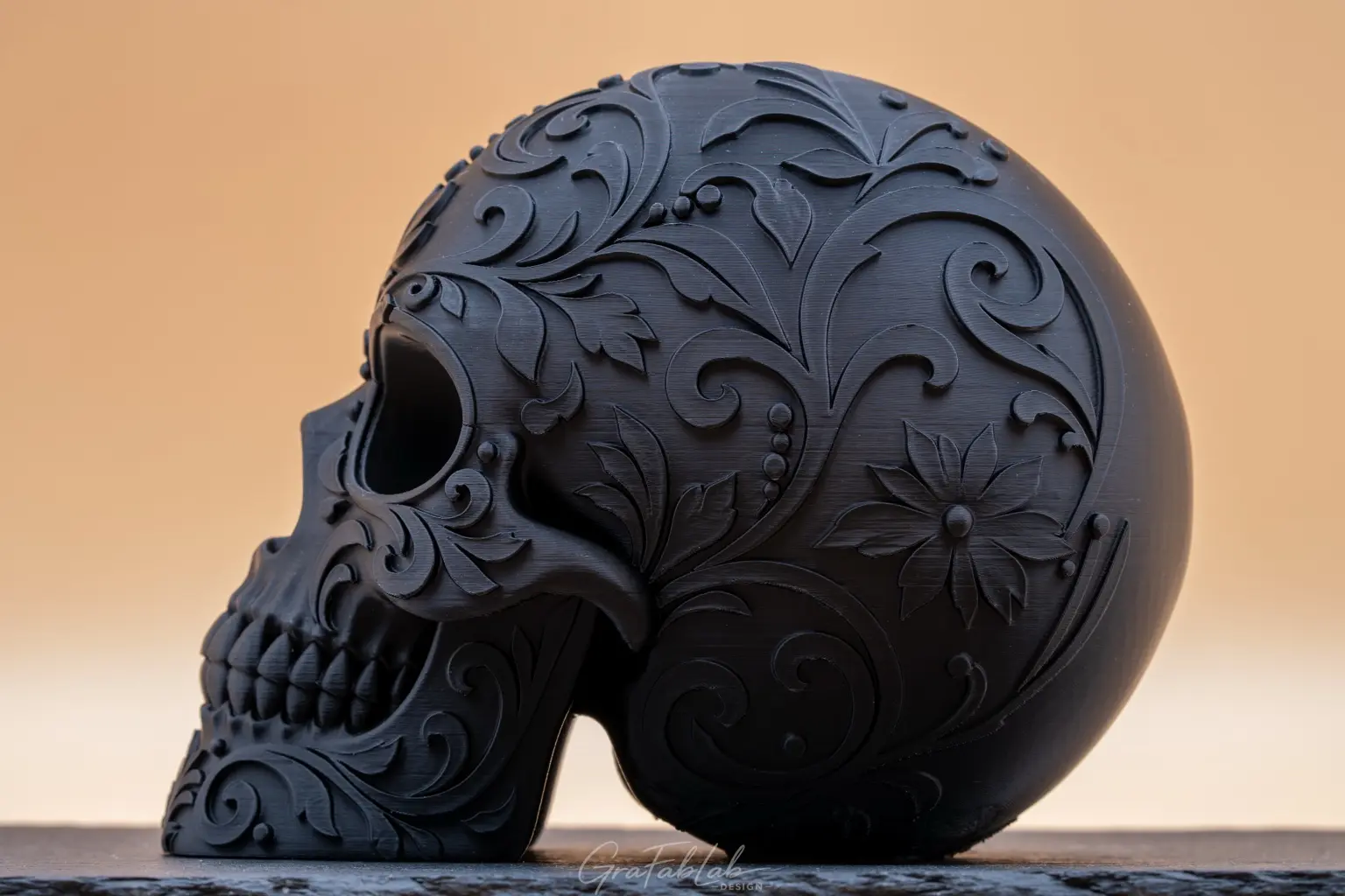 Side view showing the floral relief pattern